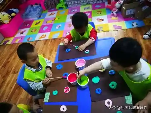 屈老师中班美术教案《甜甜圈》含PPT课件